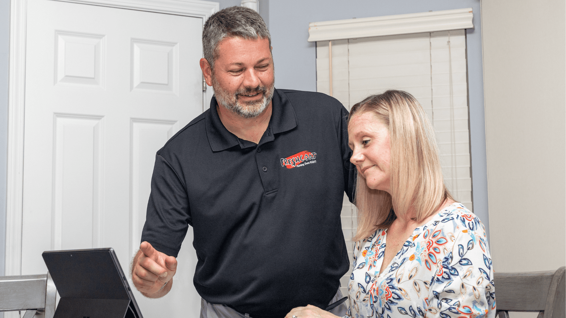 Photo of Fresh Coat Painters franchise owner and client