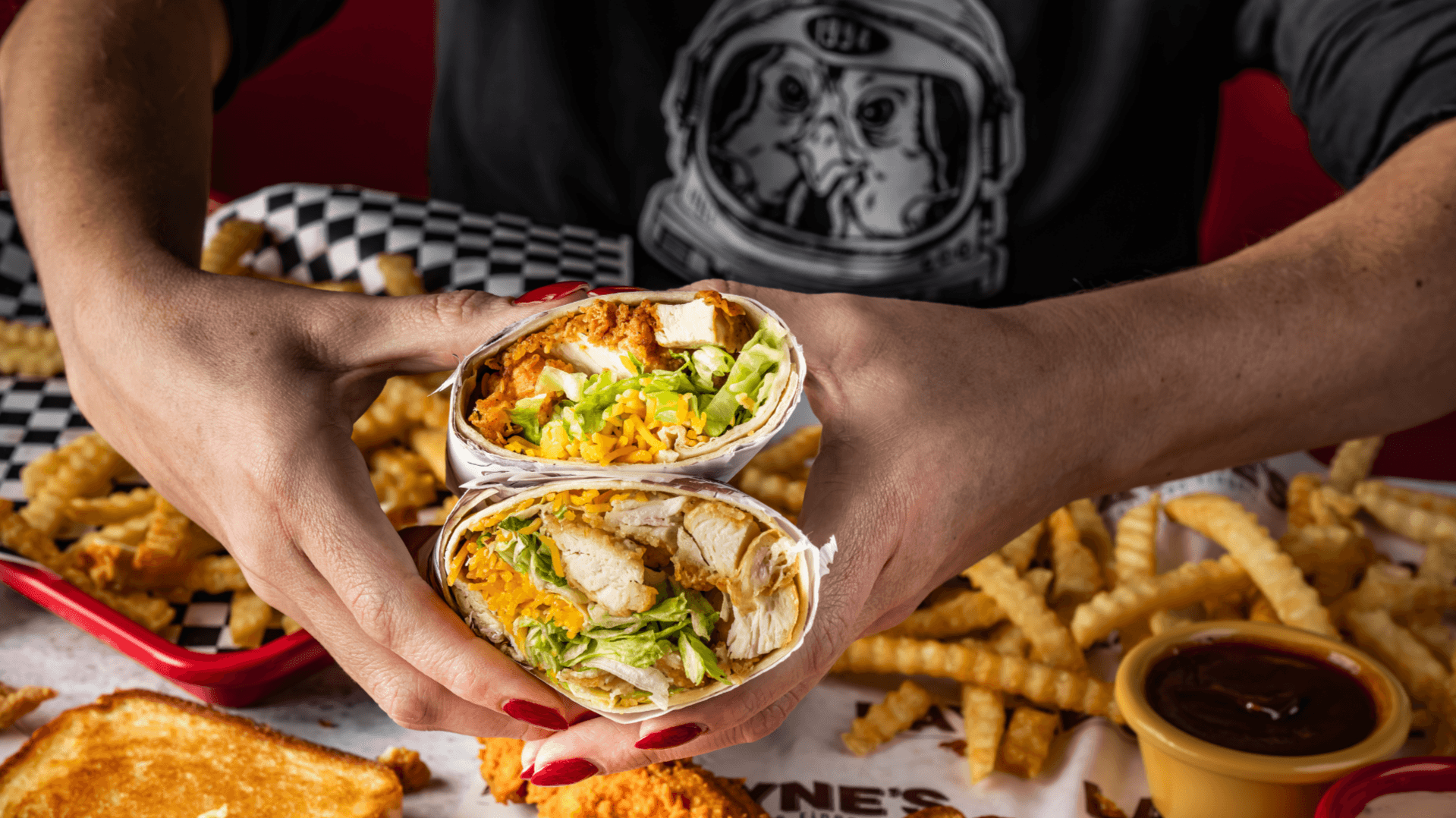 Photo of Layne's Chicken Fingers wrap, fries and toast