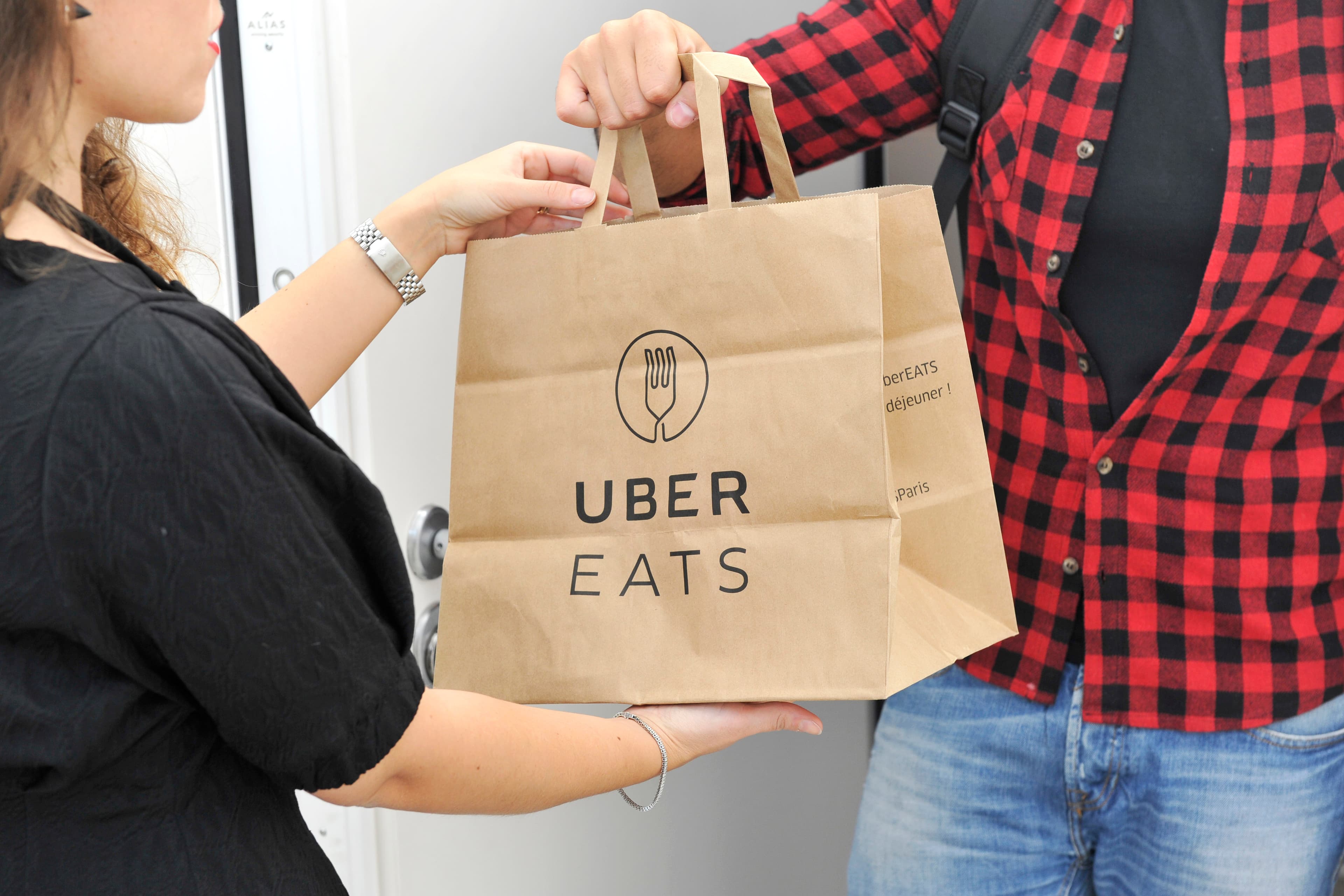 Uber Eats and Postmates Announce New Tiered-Pricing Structure