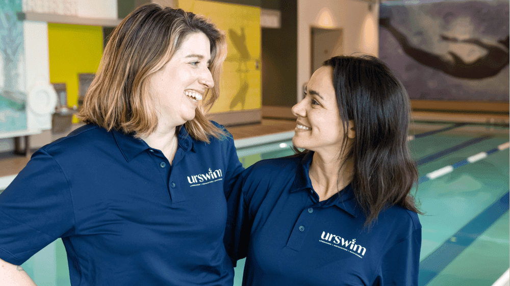 Why urSwim Gives New Franchisees Two Years of Contact Photo of two urSwim team members inside facility