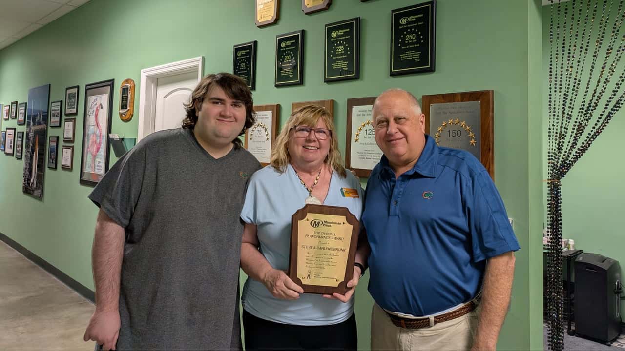 How undefined Evolved and Set New Standards Minuteman Press franchise owners Shane, Carlene, and Steve Brunk, Treasure Coast, FL.