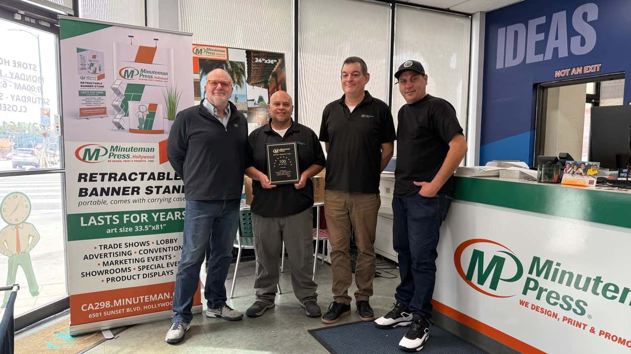 How undefined Evolved and Set New Standards Minuteman Press Franchise Owner Joe Jereb (left) pictured with his dedicated team in Hollywood, CA.