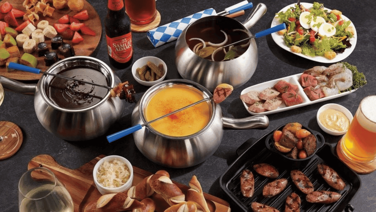 How undefined Evolved and Set New Standards Photo of Melting Pot fondue spread with cheese and chocolate, bread, meats and fruits