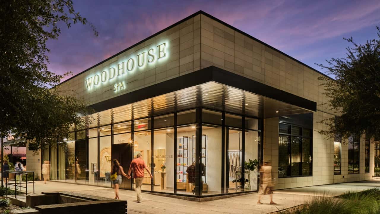 How undefined Evolved and Set New Standards Photo of exterior of Woodhouse Spa location with people walking around outside
