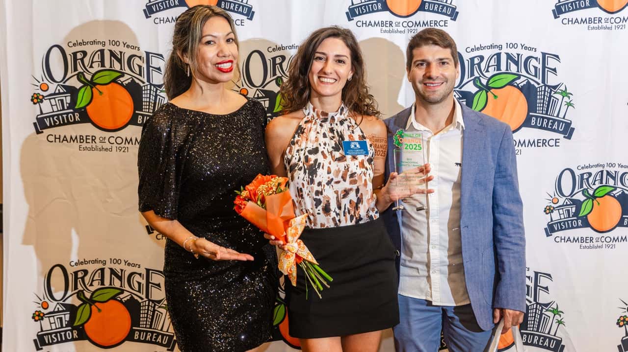 How undefined Evolved and Set New Standards Minuteman Press Franchise Owner Luciana Lorenzo (center) at the 2025 Best of Orange Awards event.