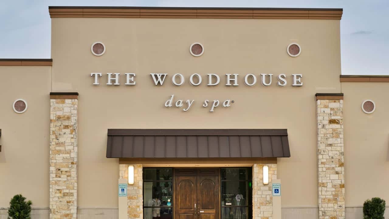How undefined Evolved and Set New Standards Photo of exterior of Woodhouse Spa location with wooden doors