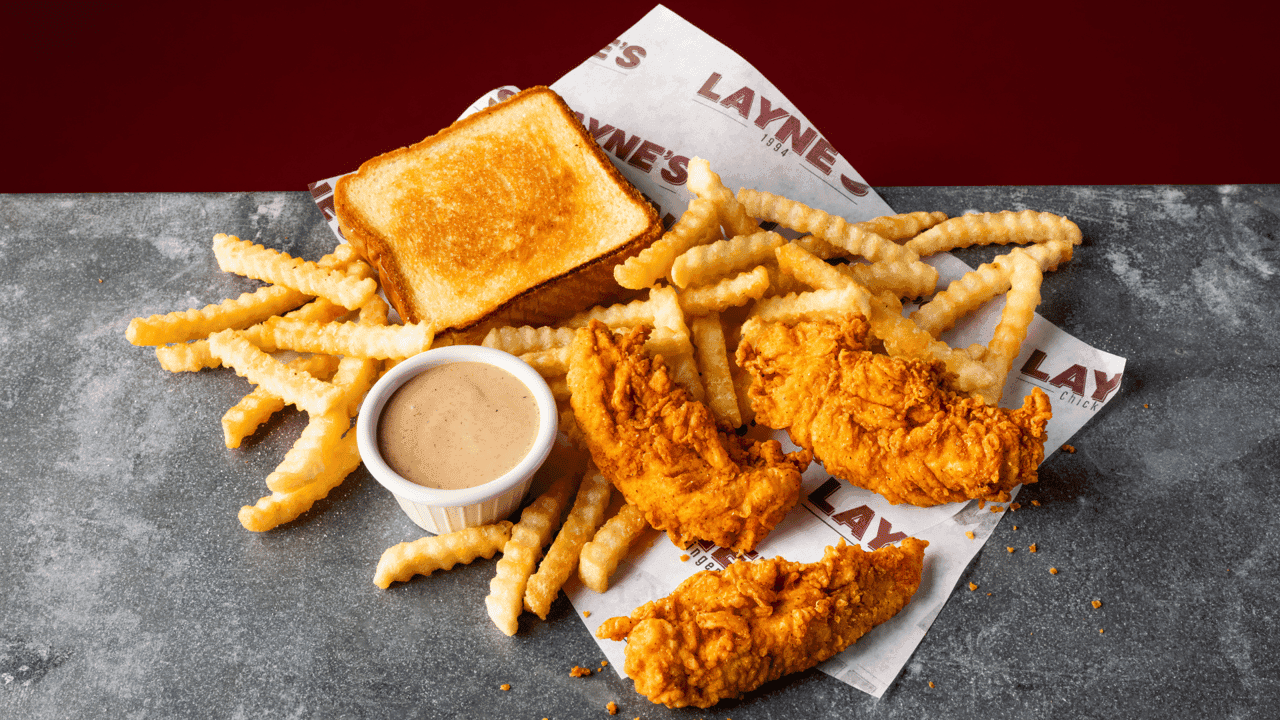How undefined Evolved and Set New Standards Photo of Layne's Chicken Fingers tenders, fries, toast and sauce