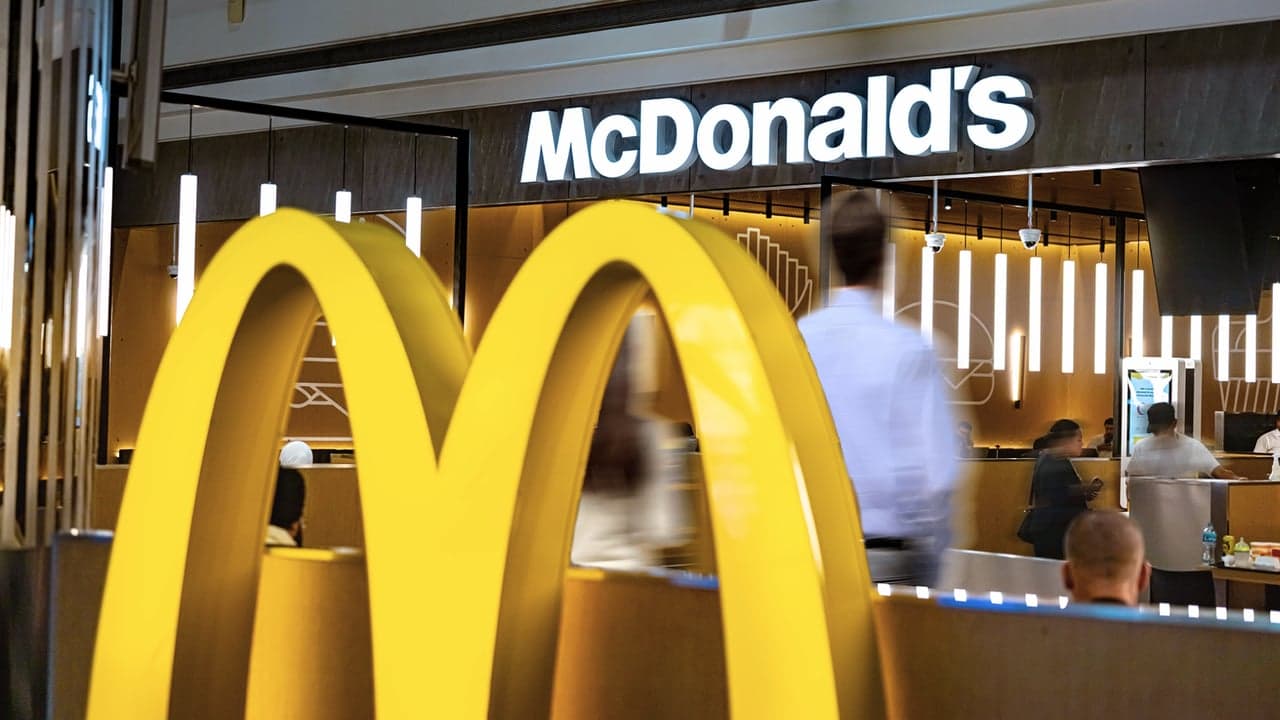 Design with McDonald's logo and inside of restaurant Design with McDonald's logo and inside of restaurant
