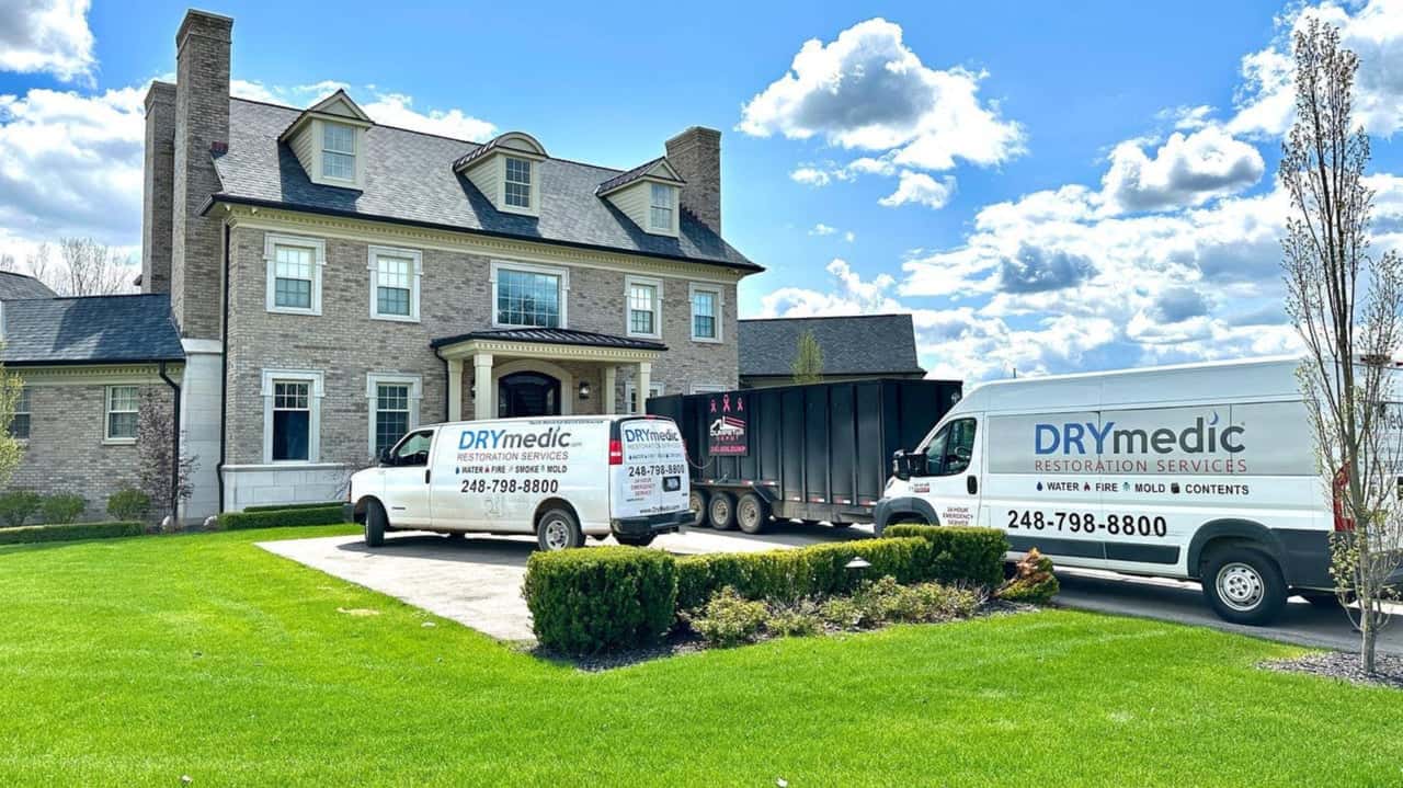 How DRYmedic Restoration Evolved and Set New Standards Photo of DRYmedic vans outside home
