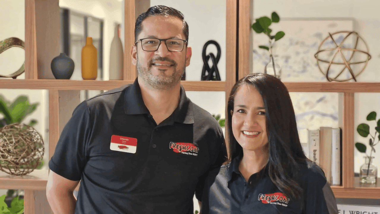 How undefined Evolved and Set New Standards Photo of two Fresh Coat franchise owners wearing branded polos
