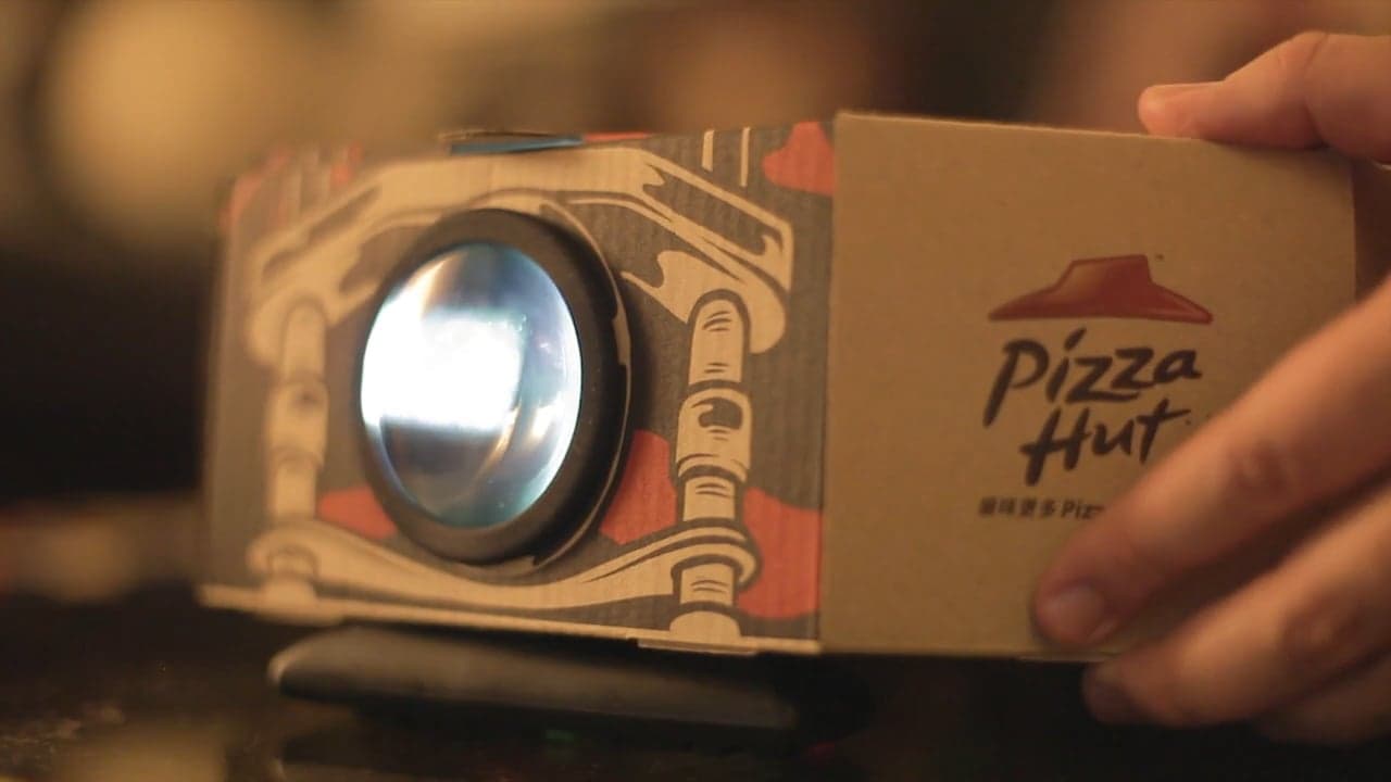 Business Insider: Pizza Hut has a new box that turns into a movie projector for your smartphone Business Insider: Pizza Hut has a new box that turns into a movie projector for your smartphone