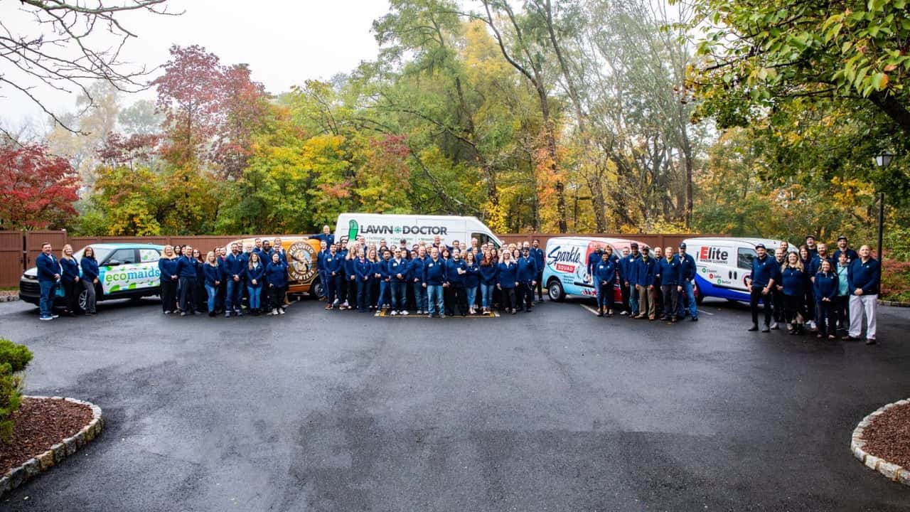 How undefined Evolved and Set New Standards Photo of Happinest Brands vans and teams standing together